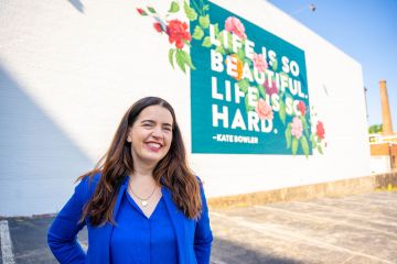 Kate Bowler’s words of comfort and honesty are attracting people to the mural in downtown Durham.