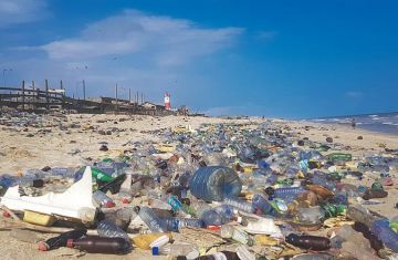 plastic dumped on the beach following Hurricane Diana