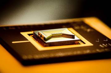 A chip containing an ion trap that researchers use to capture and control atomic ion qubits (quantum bits). Credit - Kai Hudek/JQI