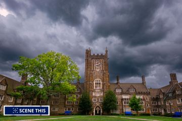 storm clouds are seen hanging over Clocktower Quad.