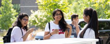 grad students enjoy snowcones during a welcome reception