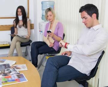 stock image of patients in doctor's waiting room